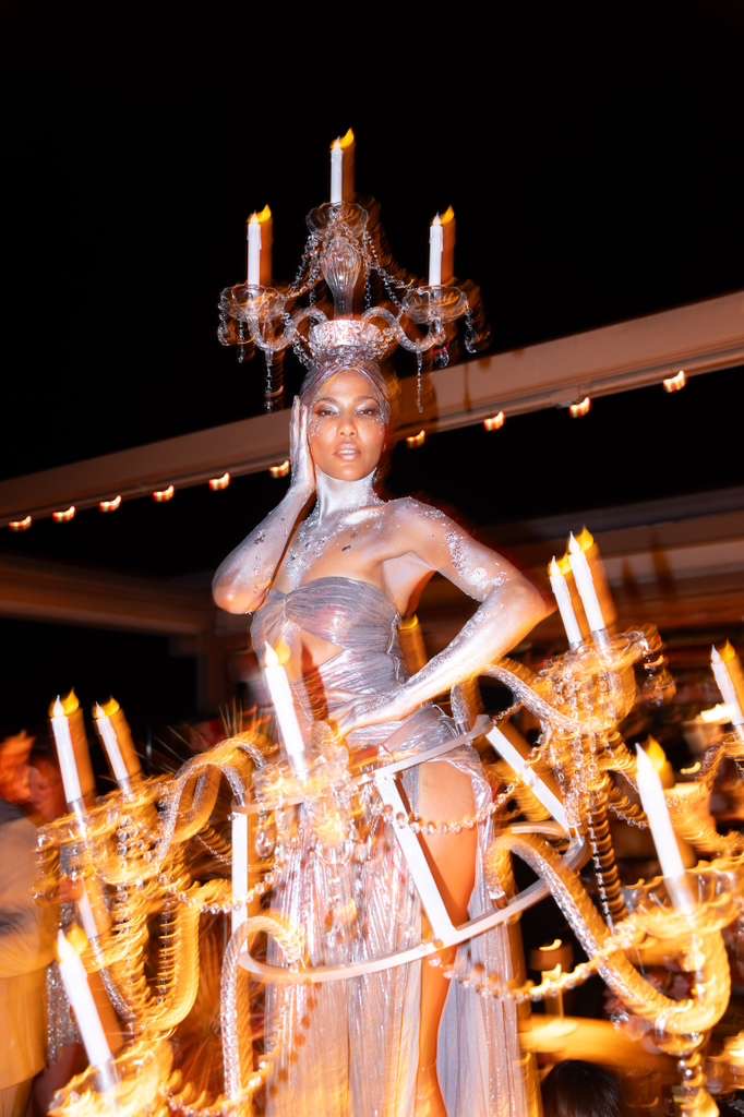 Circensia private event performer in a chandelier costume